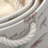 Colorful rope-woven ball and grey bow pattern storage basket Application Scenario